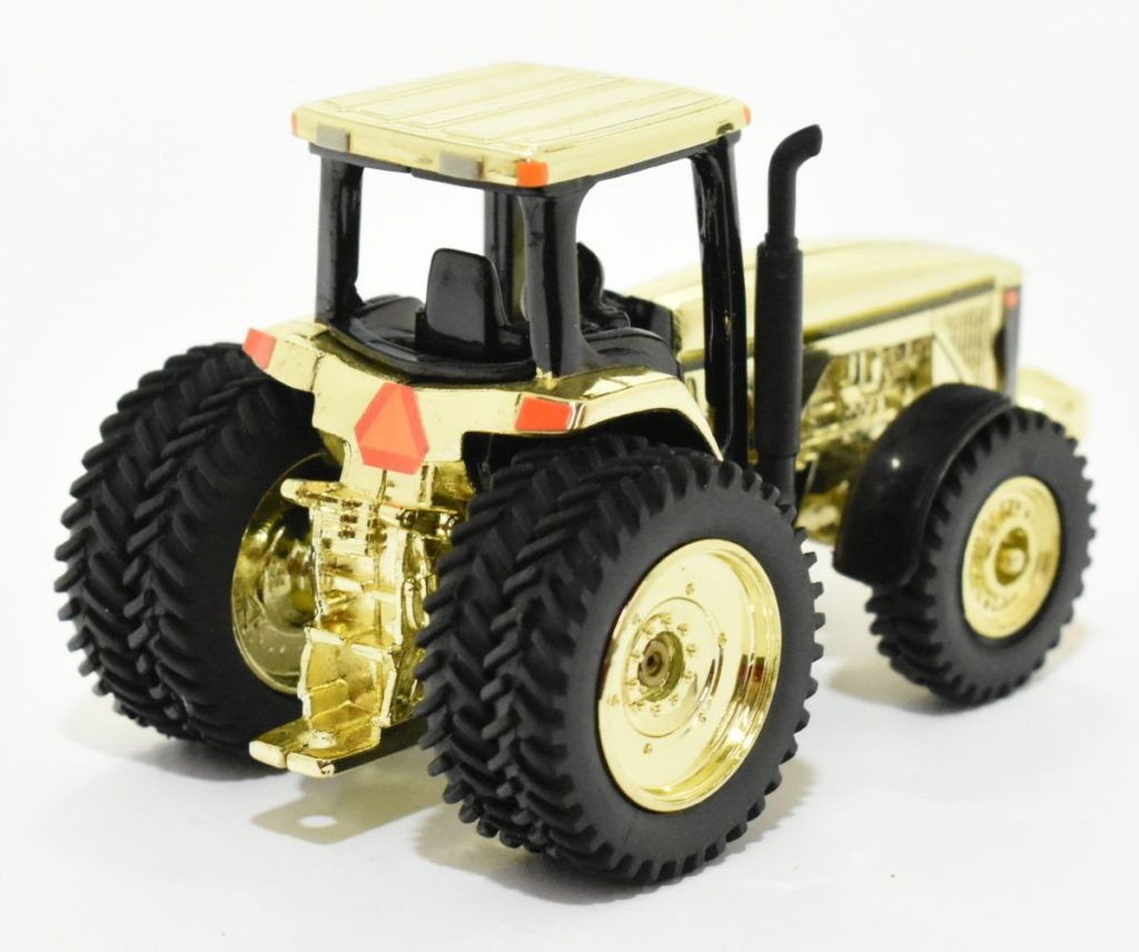 Gold John Deere Tractor With Front Wheel Assist And Dual Rear