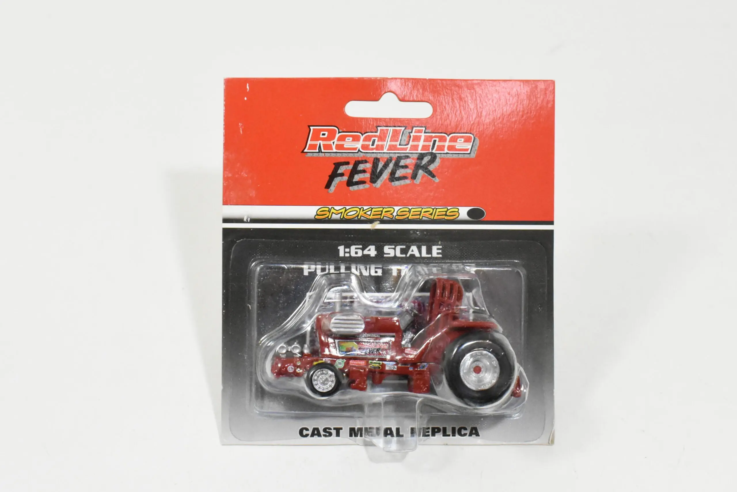 1/64 International Harvester Red Line Fever Pulling Tractor