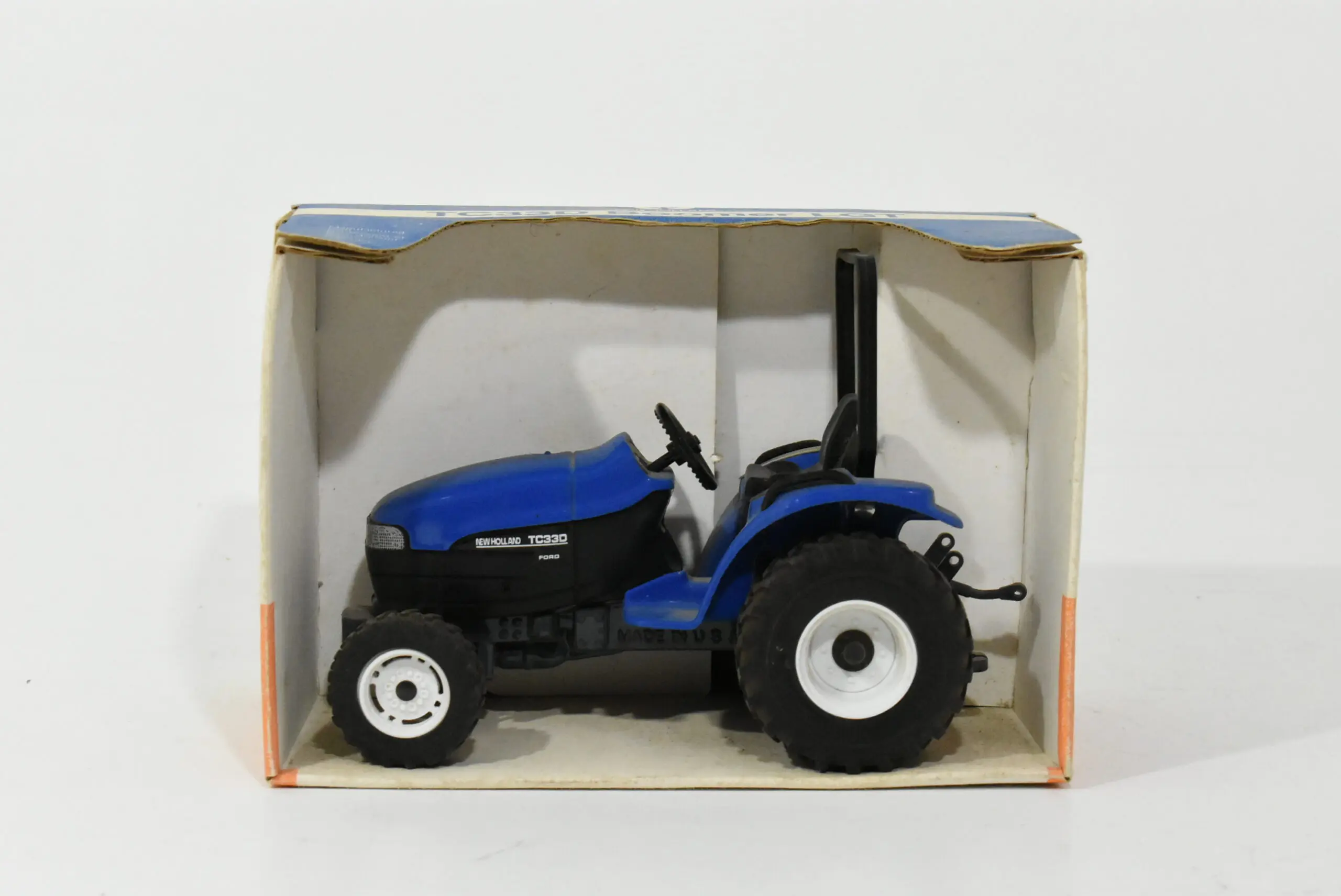 1/16 New Holland TC330 Boomer Tractor - Dalton's Farm Toys