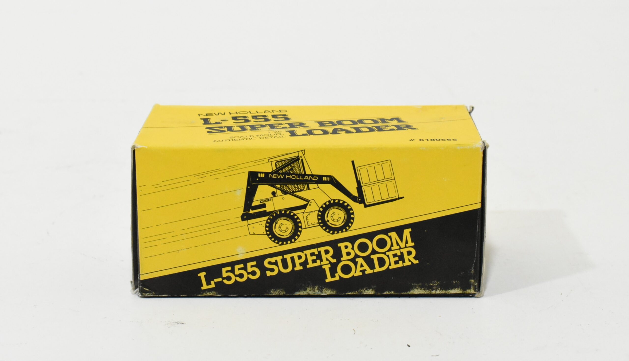 1/25 New Holland L-555 Super Boom Skid Steer Loader - Dalton's