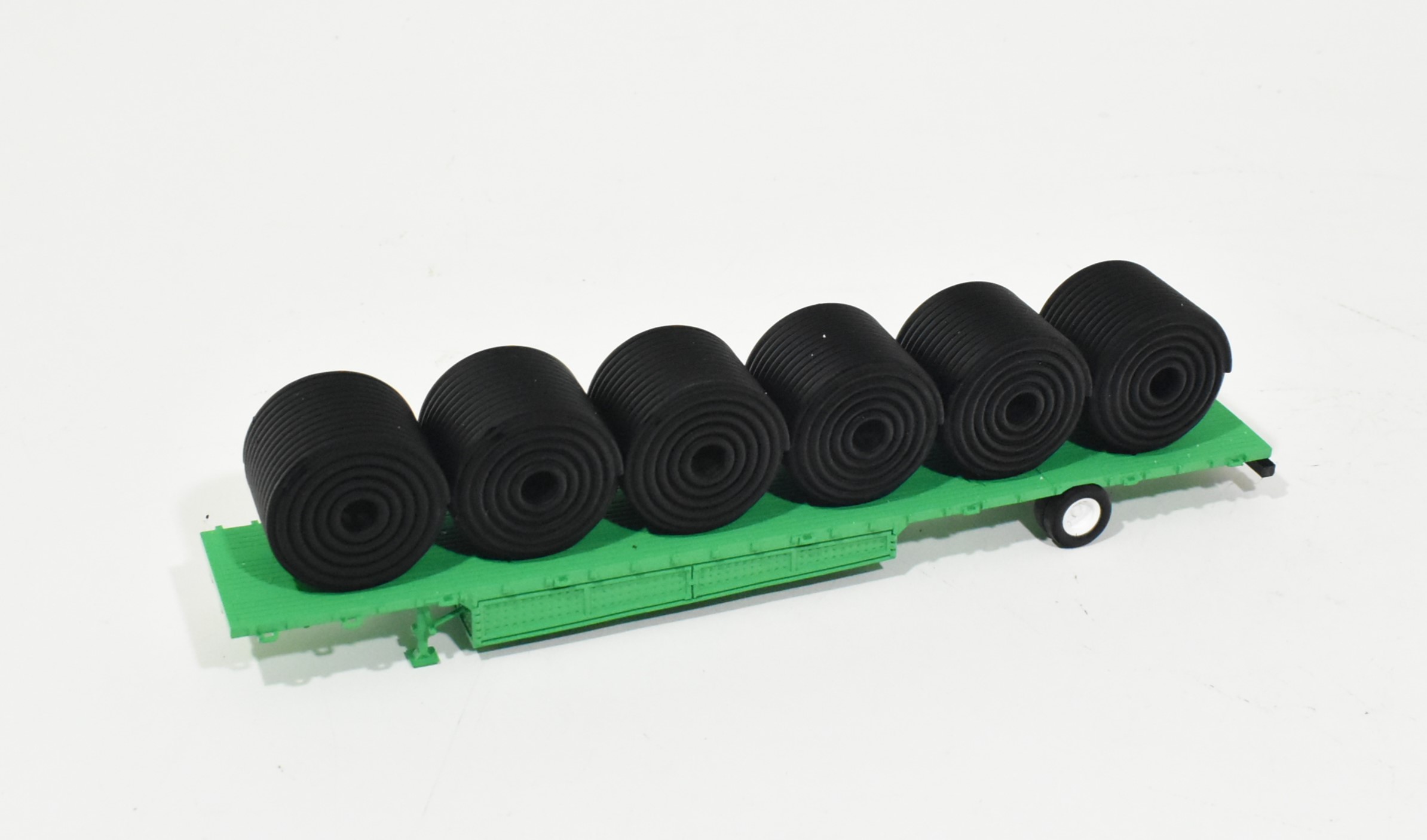 1/64 Maxi Roll Semi Tile Trailer With 6 Rolls of Tile, Green